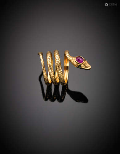 Yellow chiselled gold emerald and ruby accented coiled snake ring, g 10.04 size 10/50.