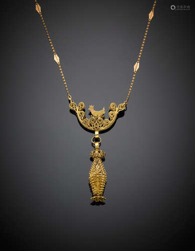 Yellow gold chain necklace with filigree pendant, g 21.83, length cm 102 circa. Marked 14 CA