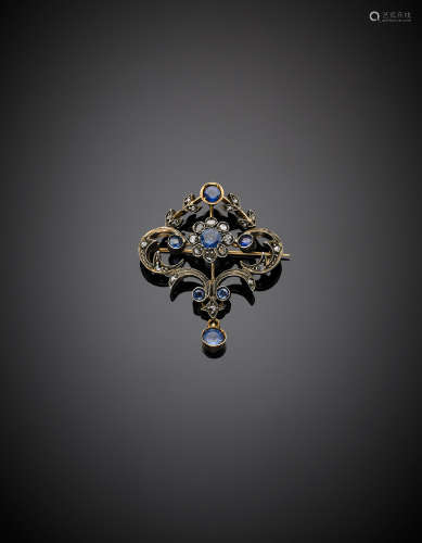 Yellow gold and silve, irregular diamond and sapphire brooch, g 7.29, length cm 4 circa.