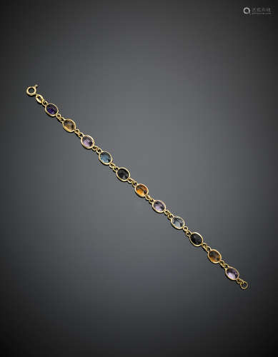 Yellow gold chain bracelet with eleven different gems, for the most part synthetic, g 7.70, length cm 18.20 circa.