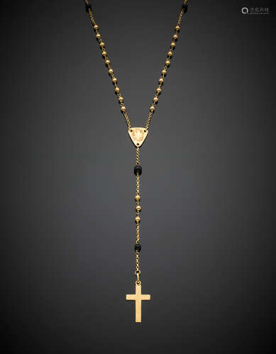 Yellow gold onyx bead rosary and cross pendant, g 15.40, length cm 25 circa.
