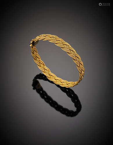 Yellow gold woven rope bracelet, g 22.24, diam. cm 6. Marked 168 TO