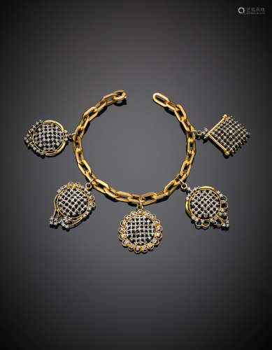Yellow gold chain and open work charms bracelet, white gold and diamond details, g 59.90, length cm 20.50 circa.