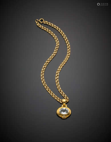 Yellow gold chain necklace with detachable light blue topaz and diamond pendant, g 30.70, length cm 37 circa.