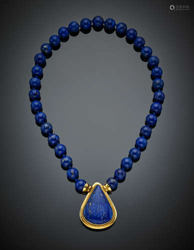 Mm 10 lapislazzuli sphere necklace centered by a large pear cabochon lapislazzuli clasp, g 75, length cm 40 circa.