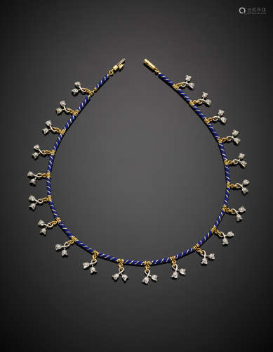 A bi-coloured gold necklace with blue enamel details accented with diamonds g 45.22, length cm 40.50 circa.