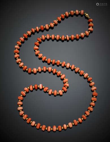 Long variegated orange coral bead necklace with yellow gold spacers and clasp, g 88.80, length cm 89 circa.