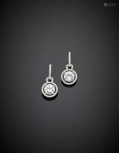 White gold pendant earrings with diamond surrounding two colourless gems, g 9.12, length cm 3 circa.
