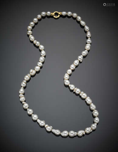 Long graduated irregular pearl necklace with yellow gold clasp, g 119.4, length cm 76.56 circa.