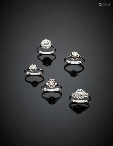 Lot of five white gold diamond solitaire rings of different shapes and sizes, g 15.00.