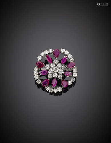 White gold round diamond, marquise and pear shaped ruby brooch, g 8.16, diam. cm 2.50.