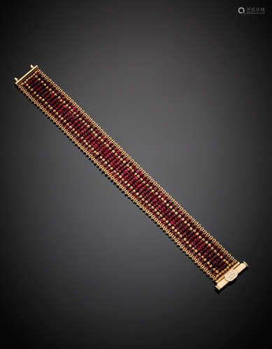 SUN DAYRed gold faceted ruby bead flexible bracelet, g 27.96, length cm 18, width cm 1.80 circa.