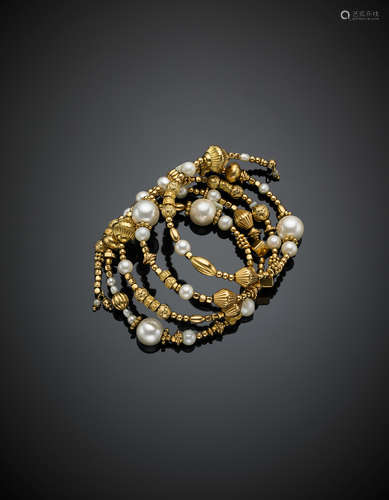 Yellow gold, pearl and synthetic pearl elastic bracelet with a metallic thread, g 76.00, diam. cm 6.5.