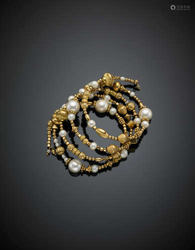 Yellow gold, pearl and synthetic pearl elastic bracelet with a metallic thread, g 76.00, diam. cm 6.5.