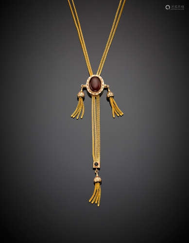 Yellow and pink gold sautoir with an oval dark red gem, and a blue vitreous paste, chain not coeval, g 47.25, length cm 64 circa.