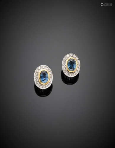 Bi coloured gold diamond and oval sapphire earrings, g 8.06.