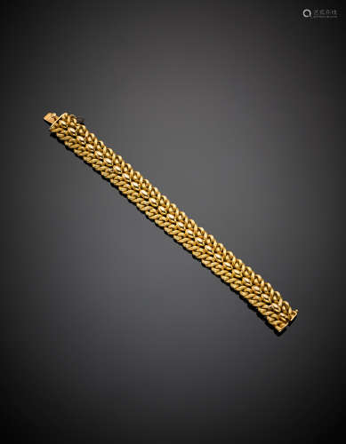 SCARDINAYellow gold knotted rope modular bracelet, g 33.95, length cm 19.50, h cm 1.70 circa. In original case (defects)