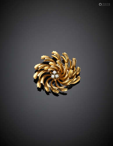 Yellow gold halo set leaf brooch, in the centre white gold set diamonds, g 19.58, width cm 4 circa.