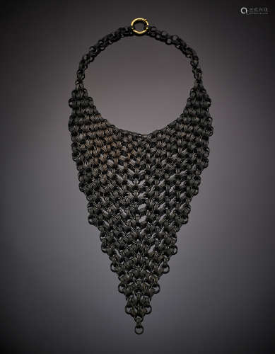 Burnished metal ring bib necklace with yellow gold clasp, g 229.90, length cm 49.00, h cm 22.00 circa.