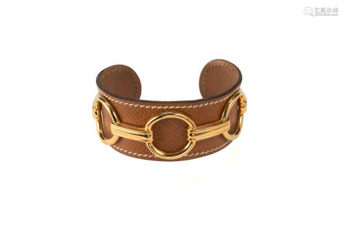 HERMESHazelnut leather and horse-bit gilt-metal motif cuff bracelet with original pouch