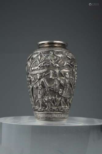 A Chinese export repousse silver vase,