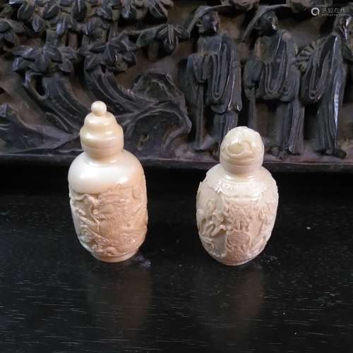 Pair of Collectible Chinese Bone Snuff Bottles w. Carving Work of Low Relief