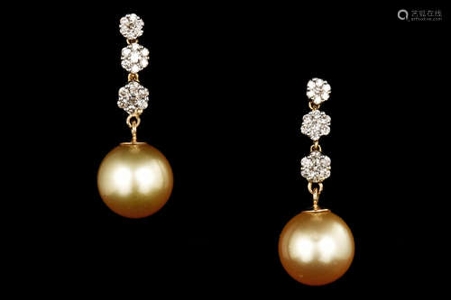 PAIR OF GOLDEN YELLOW PEARL WITH 14K YELLOW GOLD SETTING