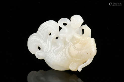 JADE CARVED 'CHILD AND FISH' ORNAMENT