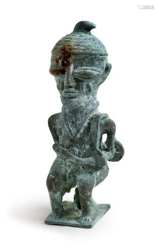 MALE SEATED BRONZE FIGURE