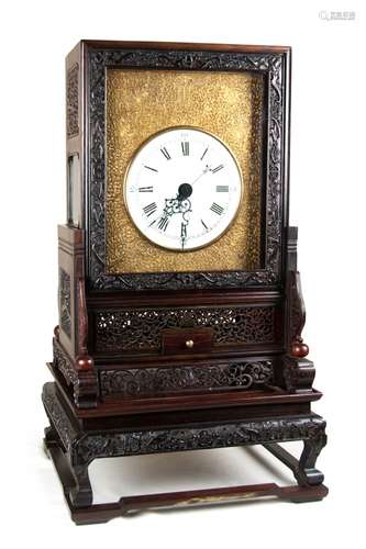 IMPRESSIVE GILT CLOCK WITH ZITAN WOOD HOUSING清 紫檀木鐘