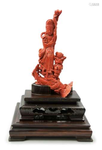 CORAL CARVED GUAN YIN ATOP A CARP珊瑚雕觀音造像