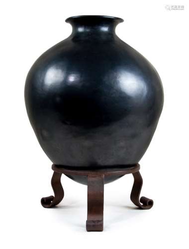 BRONZE JAR ON STAND