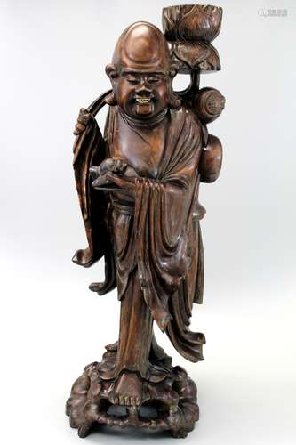 A large Chinese carved wood figure.