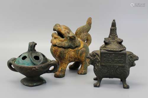 Three Asian metal incense burners.