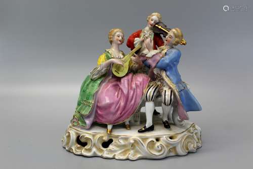 Porcelain musician figurine.