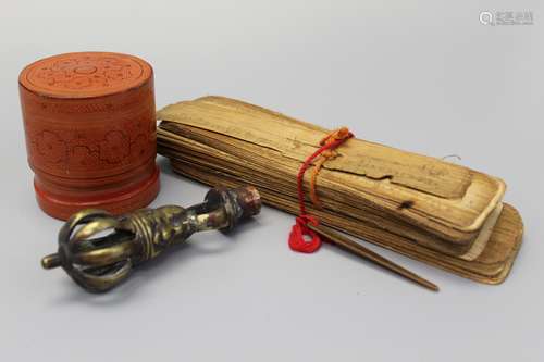 A Thai Buddhist script, a lacquer box and a bronze