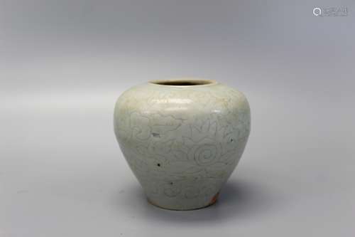 Chinese celadon porcelain jar with incised floral