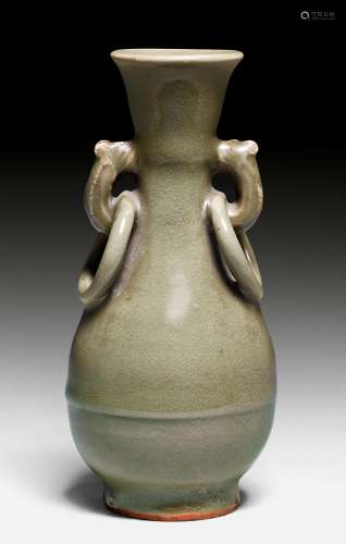A SMALL PEAR-SHAPED VASE WITH RING HANDLES, COVERED IN AN OLIVE GREEN CELADON GLAZE. China, Yuan/Ming Dynasties, H 16.5 cm.
