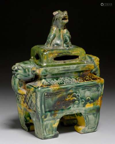 A SANCAI FANG DING INCENSE BURNER AND COVER, ORNAMENTED WITH FO DOGS. China, Ming Dynasty, H 14.8 cm. Restored.