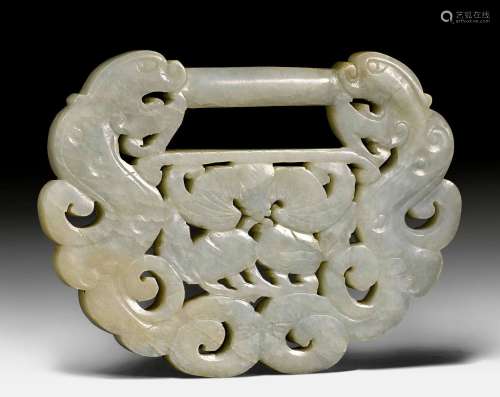 A PALE CELADON JADE PENDANT WITH AN OPENWORK DESIGN OF WRITHING DRAGONS AND A BAT. China, ca. 19th c. L 12.5 cm.