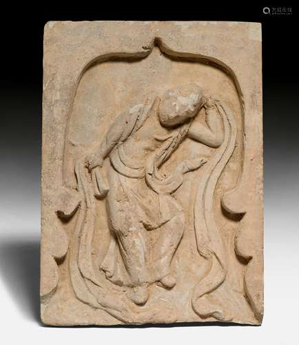 A TERRA COTTA-RELIEF OF A DANCER.