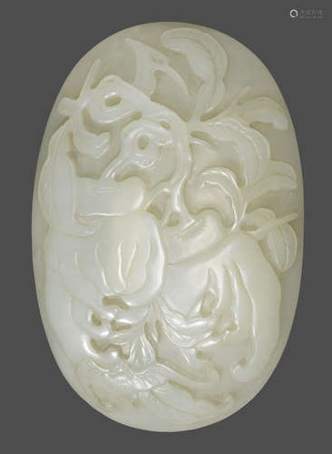 AN OVOID PALE CELADON JADE MEDAILLON.