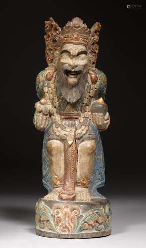 A PAINTED WOODEN FIGURE OF A DEMON, POSSIBLY RAKSHASA. Indonesia, 20th c. H 33.5 cm. Cracks.