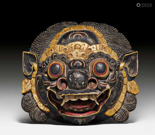 A BARONG MASK OF PAINTED WOOD WITH GILDING. Indonesia, Bali, H 31 cm.