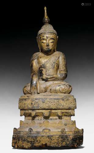 A LACQUER GILT WOOD FIGURE OF BUDDHA.