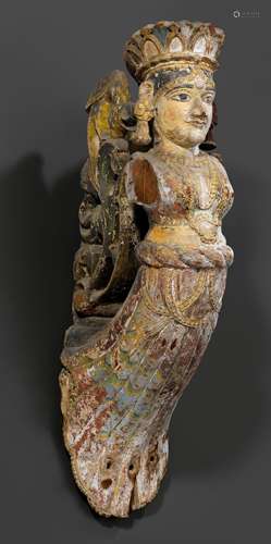 A BRACKET OF A CROWNED YAKSHI.