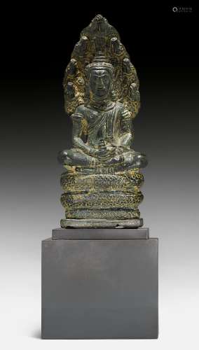 A BRONZE FIGURE OF BUDDHA MUCHALINDA.