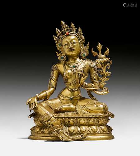 A GILT BRONZE FIGURE OF THE GREEN TARA.