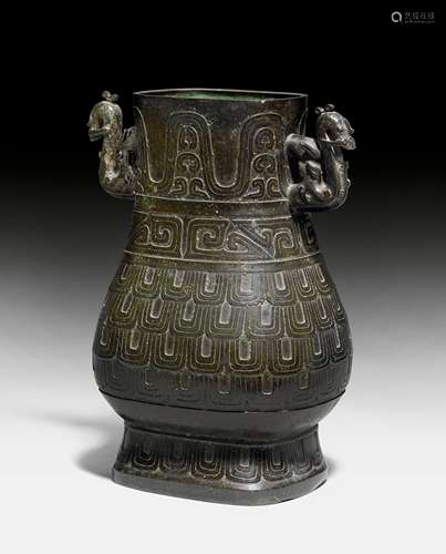 A LARGE BRONZE HU-VASE.