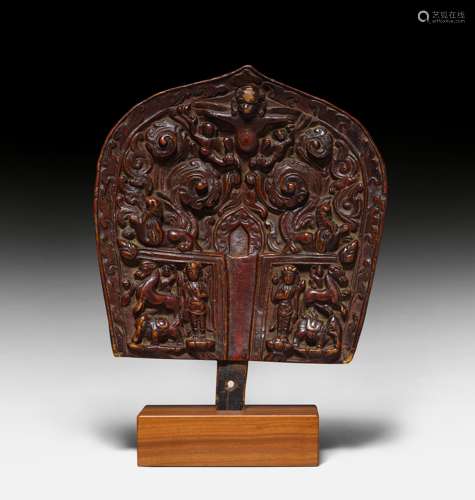 A CARVED WOOD AUREOLE (PRABHA MANDALA).